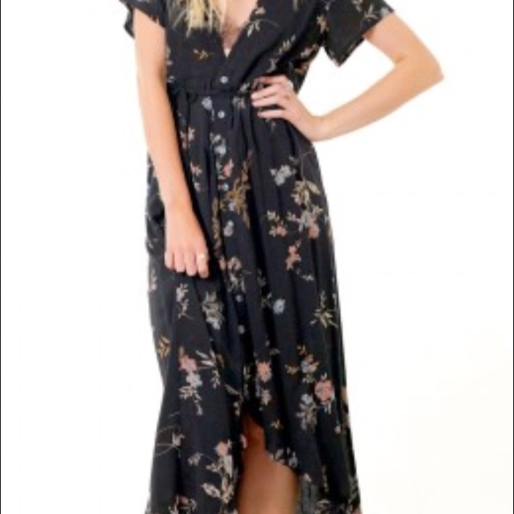 Black floral midi-dress by Saltwater Luxe